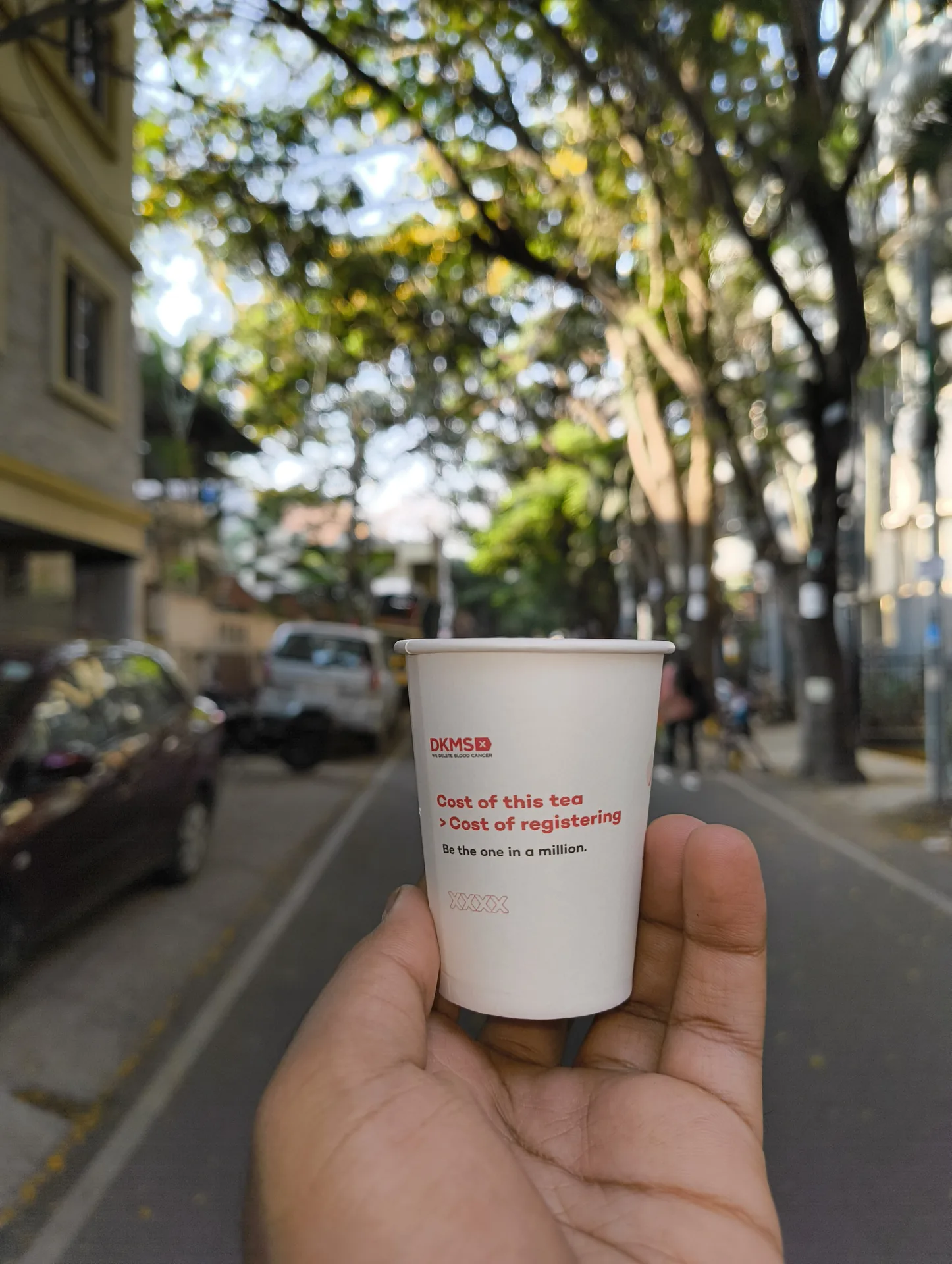 Campaign chai cup photographed in hand